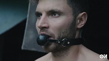 Gay handcuffed and gagged guy after male BDSM experiment